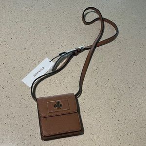 Calvin Klein Kiera crossbody wallet in tan/caramel